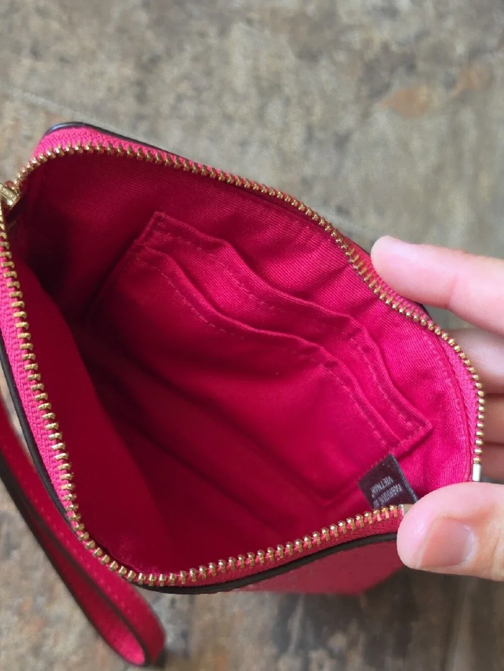 Coach Pink Signature Embossed Leather Wristlet